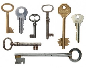 Keys from door locks on a white background.